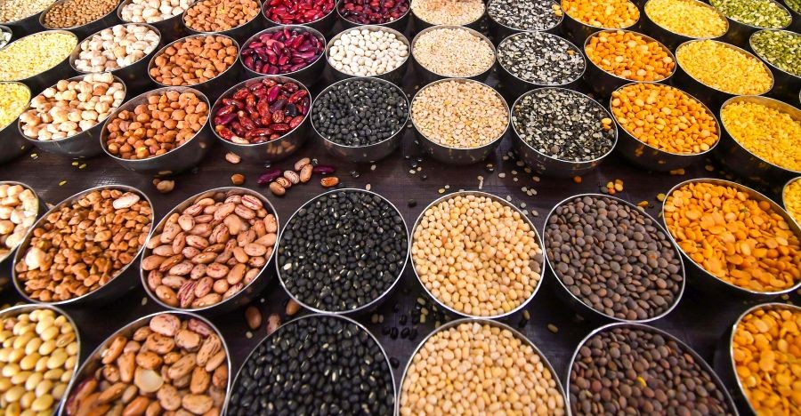 Samples of pulses are on display inside a shop at a wholesale market in Guwahati on July 23, 2024. Union Finance Minister Nirmala Sitharaman presents her seventh consecutive Union Budget today. (Photo: IANS/Anuwar Hazarika)0